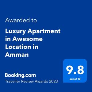 uma imagem de um telemóvel com o texto atribuído a um apartamento de luxo numa localização incrível em Luxury Apartment in Awesome Location in Amman em Amã