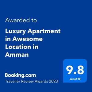 a screenshot of a cell phone with the text awarded to luxury apartment in awesome location at Luxury Apartment in Awesome Location in Amman in Amman