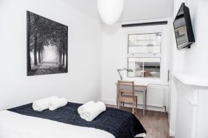 Katil atau katil-katil dalam bilik di 2Bed/Apt - ZONE 1 - 4 Tube Stations + Hyde Park