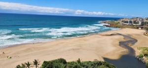 an aerial view of a beach and the ocean at Santana Holiday Resort 1002 in Margate