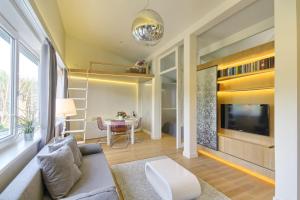 Μια τηλεόραση ή/και κέντρο ψυχαγωγίας στο Apartamentai Aqua