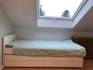 Un pat sau paturi într-o cameră la Luxury Top Floor Appartment