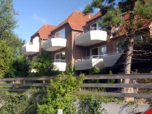 Budova, kde se apartmán nachází + 3 fotografie
