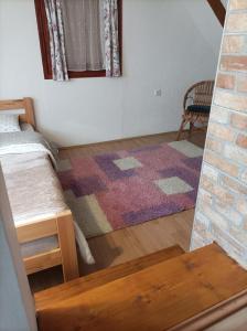 Postel nebo postele na pokoji v ubytování Planinska Kuca Tara / Mountain House Tara