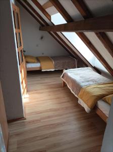 Postel nebo postele na pokoji v ubytování Planinska Kuca Tara / Mountain House Tara