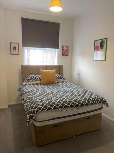 Ein Bett oder Betten in einem Zimmer der Unterkunft Minster Apartment