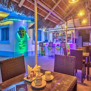 Restaurant o un lloc per menjar a Candolim Boutique House