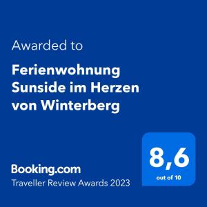 Ett certifikat, pris eller annat dokument som visas upp på Ferienwohnung Sunside im Herzen von Winterberg