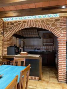 Kuchyň nebo kuchyňský kout v ubytování Casa rural La Pila