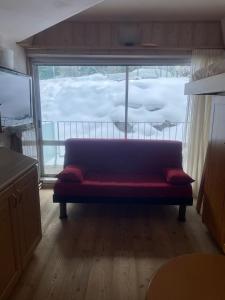 A seating area at BAITA SOLE ALTO la tua casa sulle piste da sci