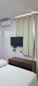 Pousada Litorânea客房内的一张或多张床位