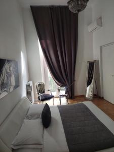 Posteľ alebo postele v izbe v ubytovaní Apartment Rome 18