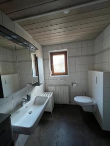 Een badkamer bij Apartment Lopez