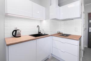 Kuchnia lub aneks kuchenny w obiekcie Balticus Apartamenty Standard Promenada Gwiazd 14