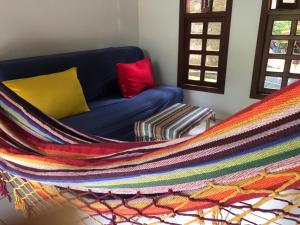 A bed or beds in a room at Vila Enayá