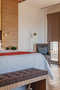 Postel nebo postele na pokoji v ubytování Hotel Plaza by Kavia