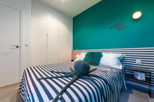 Łóżko lub łóżka w pokoju w obiekcie Whalehouse 2 - Terrace & Sea view - WIFI
