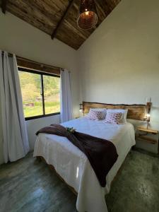Postel nebo postele na pokoji v ubytování La Casita de Charo 2