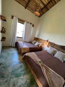 Postel nebo postele na pokoji v ubytování La Casita de Charo 2