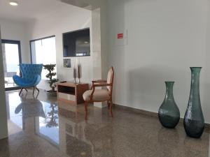 TV a/nebo společenská místnost v ubytování Villa Sunset Avenue + 26 fotografií