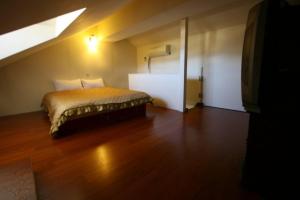 Postel nebo postele na pokoji v ubytování Dream Forest Villa
