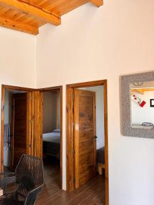 Postel nebo postele na pokoji v ubytování Cabaña "Alexa", en el corazón del bosque de Mazamitla