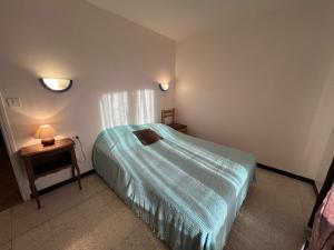 Posteľ alebo postele v izbe v ubytovaní T2 avec terrasse et parking, proche plage, 4 pers - FR-1-701-44