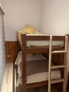 Postel nebo postele na pokoji v ubytování Cabaña en sector Aquelarre, Lago Vichuquén