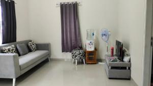 Area tempat duduk di JM HOMESTAY