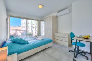 Postel nebo postele na pokoji v ubytování Le Bristol V - Happy Rentals
