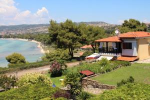 a villa with a view of the beach at Miranta in Nikiti