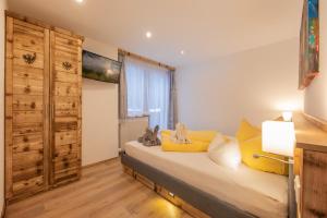 Posteľ alebo postele v izbe v ubytovaní Art-Apartments Kartnaller superior