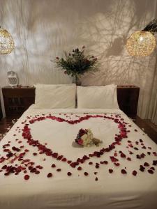 Letto o letti in una camera di Nacpan Beach Resort Managed by H Hospitality Group