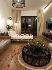 Letto o letti in una camera di Nacpan Beach Resort Managed by H Hospitality Group