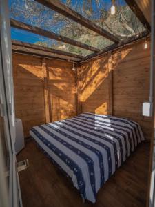 A bed or beds in a room at Agriturismo S.Ilario