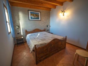 A bed or beds in a room at Agriturismo S.Ilario