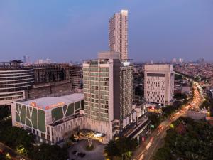 an aerial view of a city with tall buildings at Midtown Residence Surabaya in Surabaya