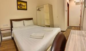 Letto o letti in una camera di AMB LAI LAI HOTEL