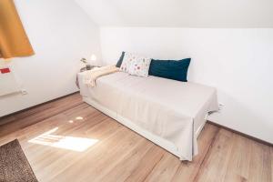 Postel nebo postele na pokoji v ubytování Apartmán Podkroffka