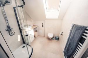 Koupelna v ubytování Apartmán Podkroffka + 15 fotografií