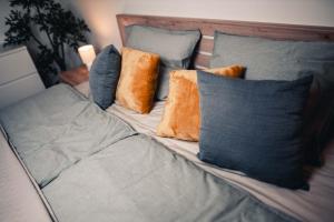Postel nebo postele na pokoji v ubytování Apartmán Podkroffka