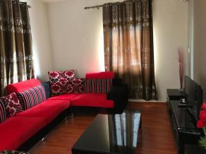 Et tv og/eller underholdning på SEASIDE HAVEN KEI BHarmony Appartments