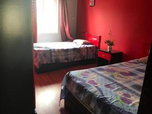 En eller flere senge i et værelse på SEASIDE HAVEN KEI BHarmony Appartments + 5 billeder