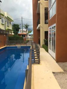 Swimmingpoolen hos eller tæt på SEASIDE HAVEN KEI BHarmony Appartments