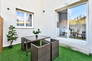 Patio nebo venkovní prostory v ubytování Appartement L’Élégant - Idéalement Situé