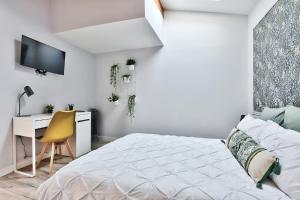 Postel nebo postele na pokoji v ubytování Appartement L’Élégant - Idéalement Situé