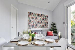 Posezení v ubytování Appartement L’Élégant - Idéalement Situé + 8 fotografií
