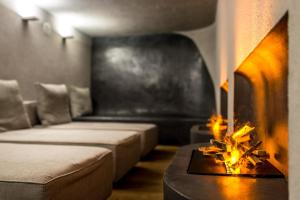A bed or beds in a room at Sportony Mountain Lodges
