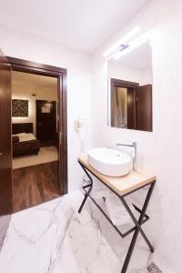 Postel nebo postele na pokoji v ubytování Hotel Belvedere