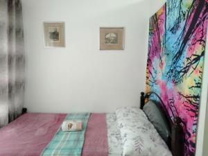 Postel nebo postele na pokoji v ubytování Mai Staycation